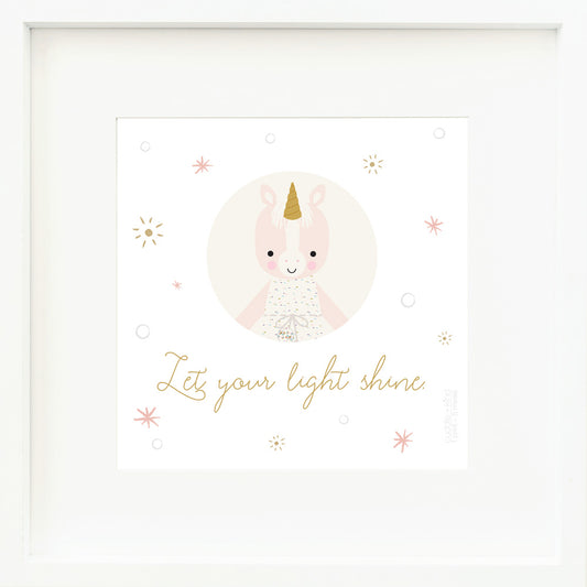 An inspirational print with a graphic of Ella the unicorn on a white background with star accents and the words “Let your light shine” in golden yellow.