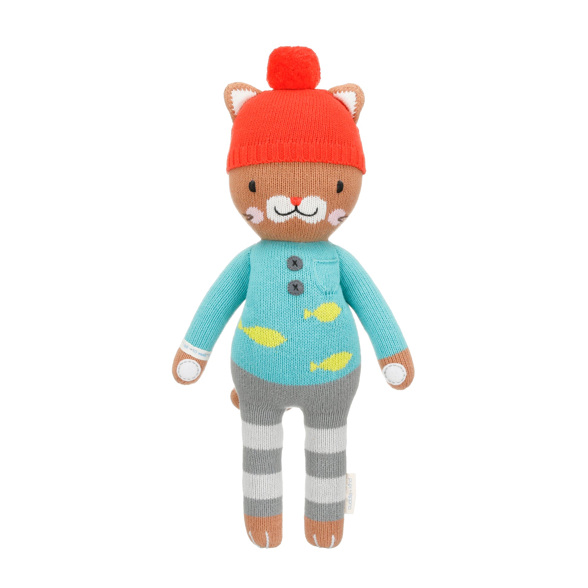 Maximus the cat shown from 360°. Maximus is wearing a blue sweater with yellow fish on it, gray striped pants, and a red pom-pom hat.